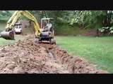 Backfilling trench with the yanmar