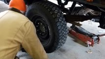 Installing snow tire chains - Heavy duty cleated v-bar chains on my plow truck