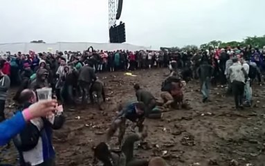 Concert Crowd Delight in Spontaneous Mud Slinging