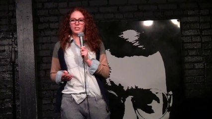 Girl's pants almost fall down while performing standup