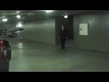 Guy smacks head really hard in underground parking lot