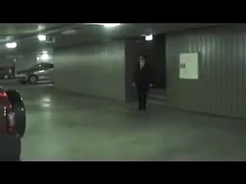 Guy smacks head really hard in underground parking lot