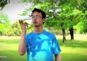 Solving a Rubik's Cube One-Handed While Spinning a Frisbee