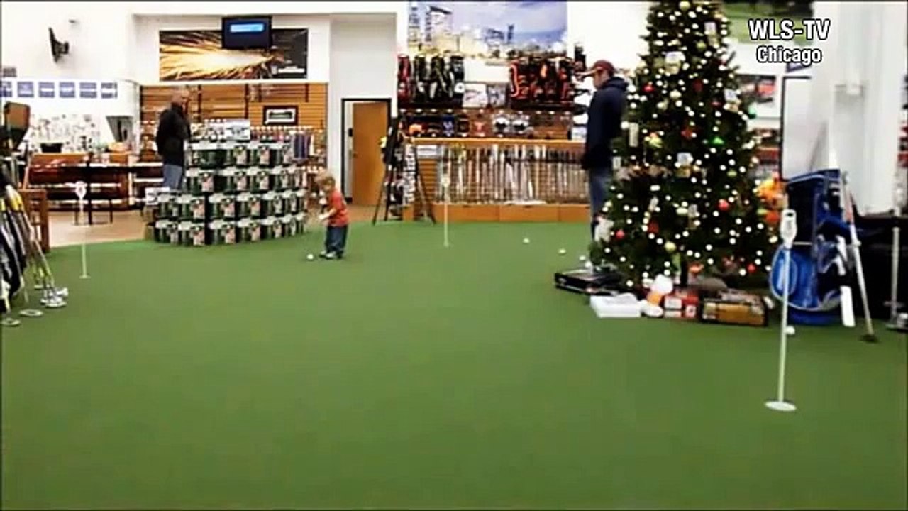 21 month old Owen golfing