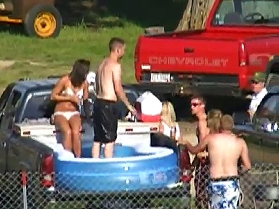 WAPAKONETA, OH TRACTOR PULL POOL SIDE PULLING!!! FUNNY STUFF!!! MAY 29TH, 2010.mpg