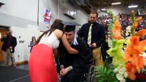 Paralysed student walks to collect diploma at graduation