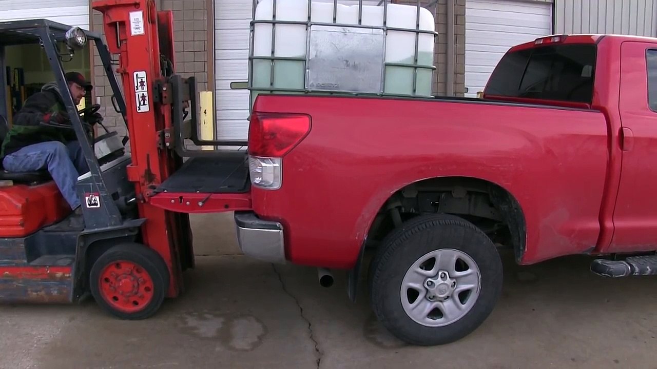 Installation of the Firestone Ride-Rite Air Helper Springs on a 2013 Toyota Tundra - etrailer.com
