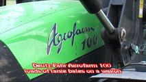 Deutz Fahr Agrofarm 100 loads of large bales on a wagon 2012