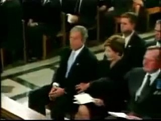 GW Bush give son George W a masonic handshake on 9/11