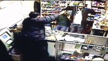 Clerk Opens Fire On Two Armed Robbers-Caught on Camera