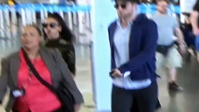 Robert Pattinson and FKA Twigs arrive at JFK airport in NYC 03.05.2015 #2