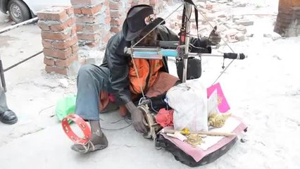 Amazing one-man band Indian street performer