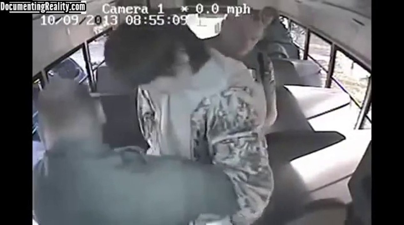 Cops break kids arm on a bus
