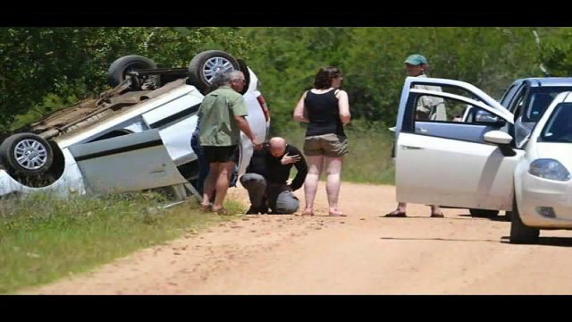British couples car: Raging bull elephant flips South African safari