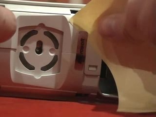 Decoller l'autocollant garantie xbox 360