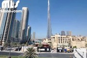 A bright two bedroom apartment with views of the Boulevard fountain   Burj Khalifa from the balcony. - mlsae.com