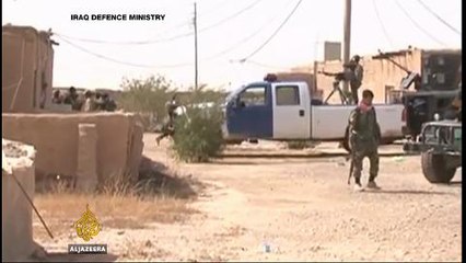Fierce fighting rages near airbase in Iraq's Anbar