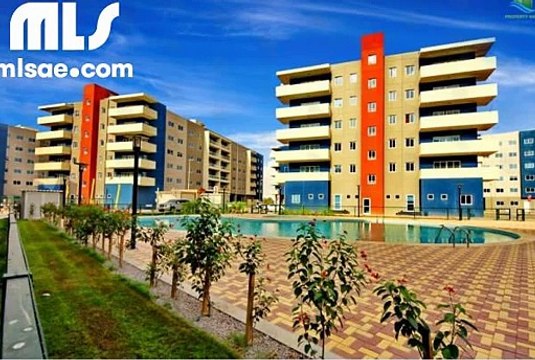 1BR apartment for sale with balcony access on ground floor at Al Reef. - mlsae.com