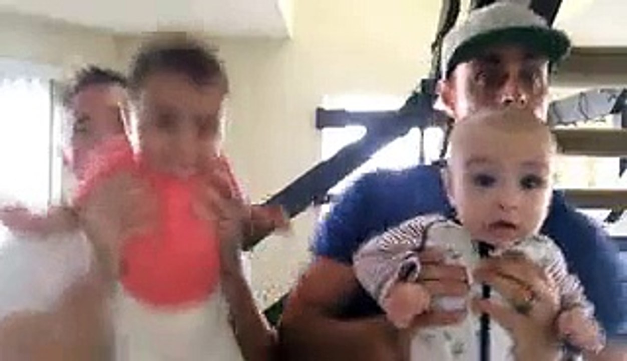 Dancing Daddies Enjoy a Silly Moment With Their Babies