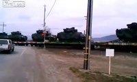 Military industrial complex IS SOMETHING BREWING? 100'S OF TANKS BEING TRANSPORTED CA