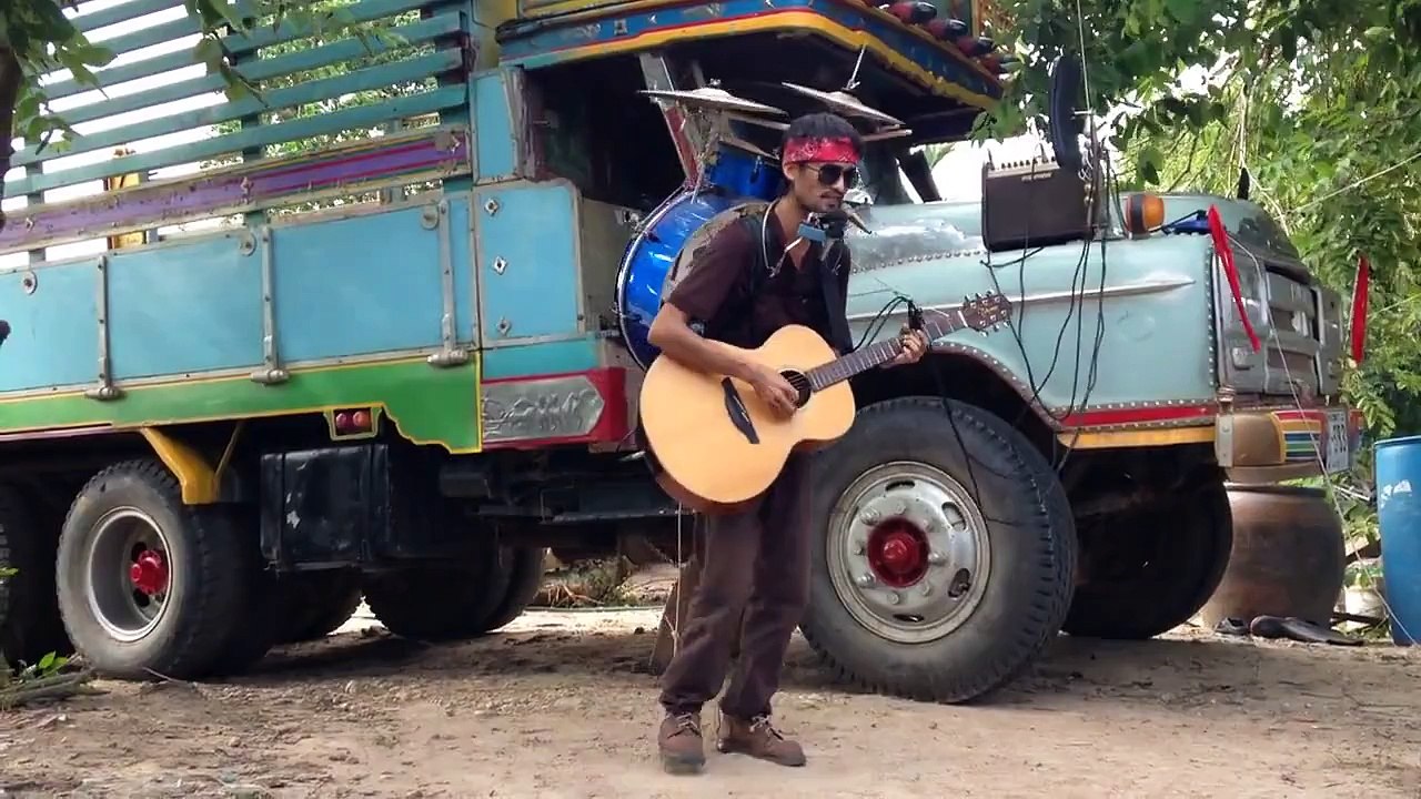 One Man Band, Guitarist, Drummer, Singer all at one time WOW