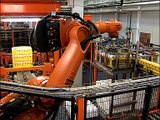 Paletizing  - Orange Juce - KUKA -  Robot System presented by Baumann Packaging Systems
