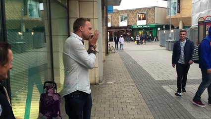 A beatboxer harmonica helps a homeless