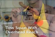 Improve Fitness With The Total Body Workout - Toe Squat with Overhead Reach