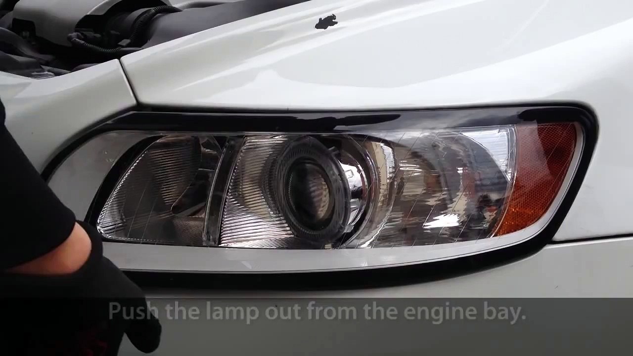 How to remove headlights in Volvo C30, S40, V50, C70 (light bulb change)