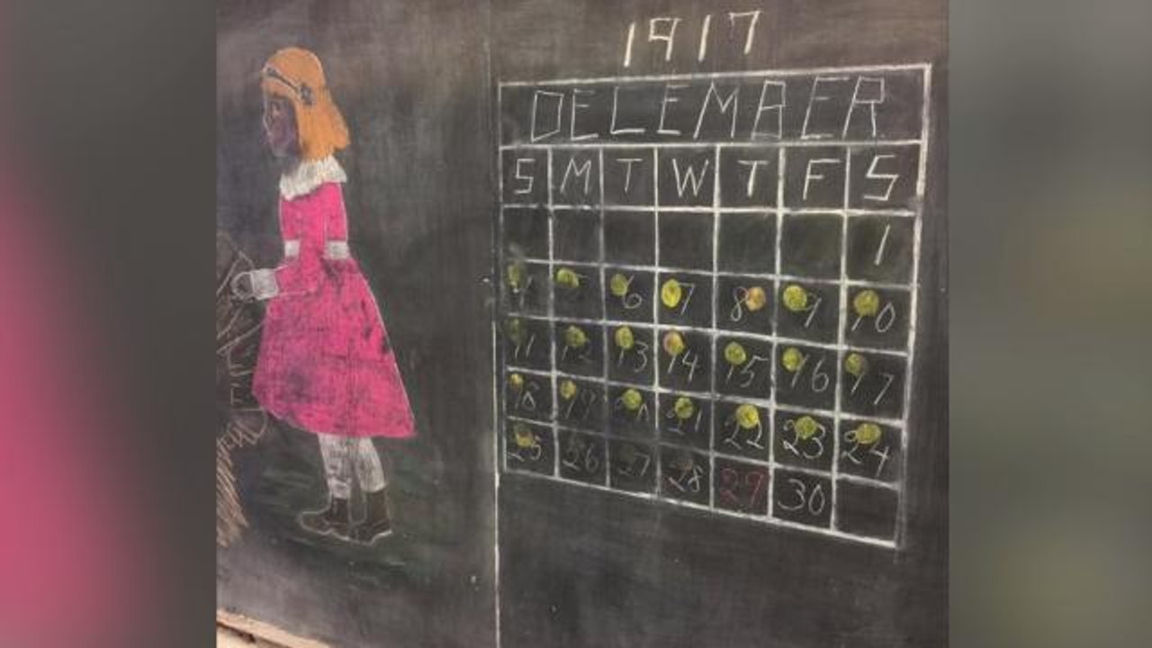 98-year-old chalkboard uncovered with lessons frozen in time