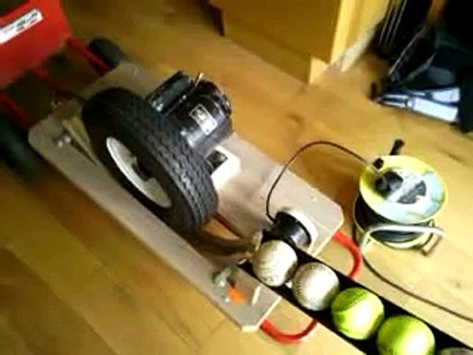Home made pitching machine - ball feeder