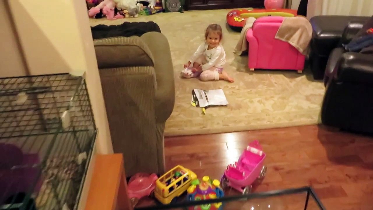 S cute 2 year old triple diaper dance puts extra diapers on herself MVI 0351