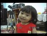 Cute Little Asian Girl Singing