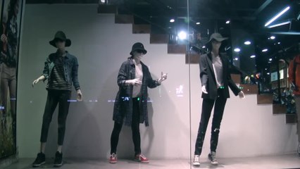 Girl posing as manikin performs insane dubstep dance