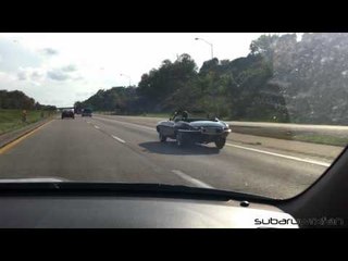 Jaguar E-Type On The Road