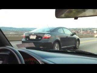 Honda S2000 races a punk in a Scion TC!