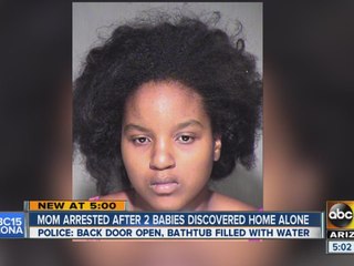 Mom arrested after two babies discovered home alone