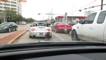 RACISM - White Men Dragging Brown Teddy Bear behind Luxury Car