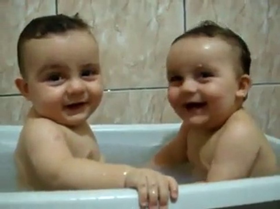 Twins Brothers Enjoying Bath Time