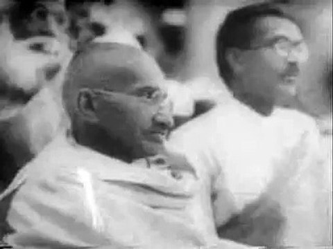 Gandhi using a Spinning Wheel in India - Gandhi video footage