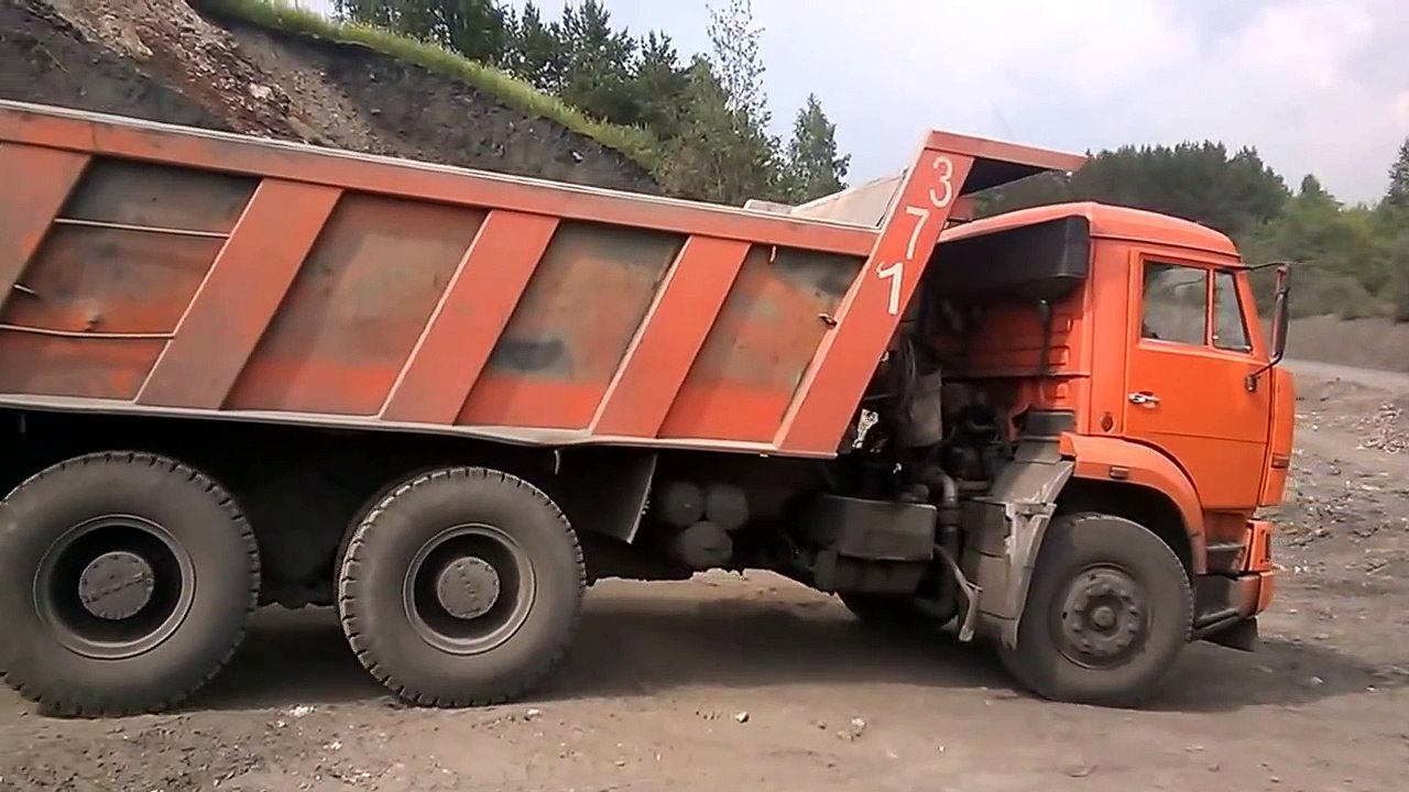 камаз 6520 под загрузкой экскаватором DOOSAN solar 500 lc