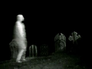GHASTLY GRAVEYARD GHOST VIDEO -  PARANORMAL ACTIVITY CAUGHT ON TAPE