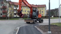 Hitachi Zaxis 160W cutting asphalt