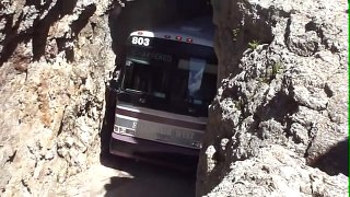 Charter Bus in Rock Tunnel