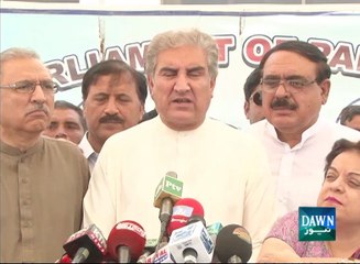 Shah Mehmood Qurashi talking with media outside Parliament