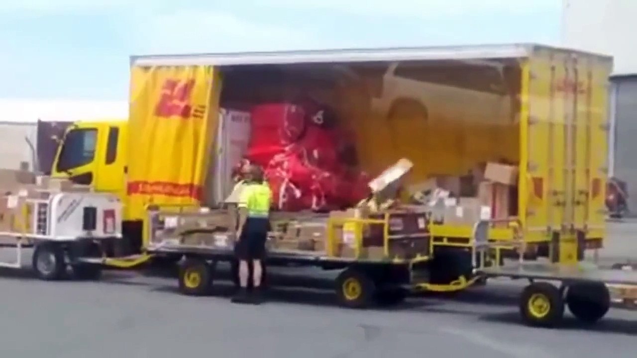 DHL parcel handlers shamed in Facebook video which shows workers THROWING packages from their truck
