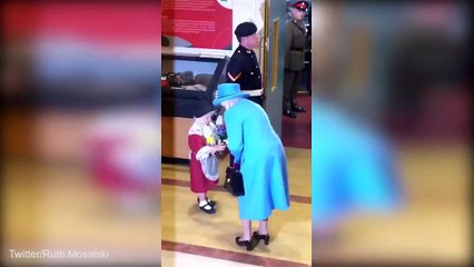 Only To Be Smacked On The Head By a Saluting Soldier_Ouch! Little girl Presents A Posy To the Queen.