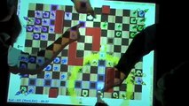 [ITS 2009 Demo] RealTimeChess: a Real-Time Strategy and Multiplayer game for Tabletop Displays