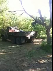 M35a2 Army Truck pulling down tree