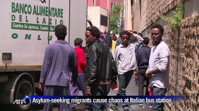 Station chaos deepens Italy migrant crisis